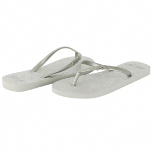 Ed Hardy Capistrano  Flip Flop for Women - Silver - Simple and classic styling craft the Capistrano flip flops from Ed Hardy. These easygoing sandals feature a durable rubber upper with toe post attached to a cushioned graphic-embossed footbed for lasting comfort and support. It makes a great traveling companion, easily tuckable into your weekend tote or carry-on.