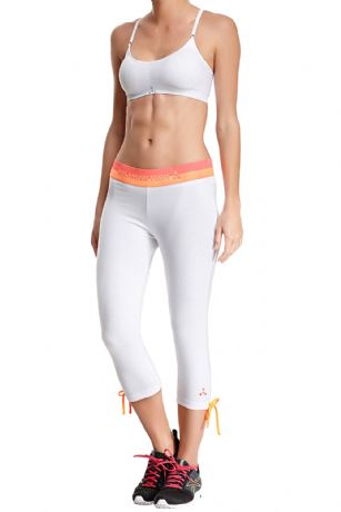 Balanced Tech Women's Knitted Jersey Capri - White - Sleekgreat foundation for your athletic wardrobe, the Balanced Tech Women's Jersey Capri Pant  is made from Lightweight 94% Cotton/ 6% Spandex fabric that's super soft and comfortable is a must have in any active and lounge wardrobe. Wear it as a layering piece, workout, around the house or to sleep in. Features Contrast Balanced Tech logo Graphic elasticized waist andcontrast drawstring let ties at bottom. Pant measures: 9" rise, 18" inseam. Stretch construction improves mobility and maintains shape,It keeps you comfortable and cool throughout your workout. About the Brand - "Balanced Tech" is an activewear brand that infuses technology, Driven by the latest trends with style and comfort for everyday goals and challenges. Whether you are working up a serious sweat or hanging out on a Sunday, you can always look and feel great with Balanced Tech!