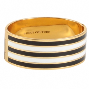 Juicy Couture Stripe Enamel Bangle - Make a striking statement with this enamel bangle bracelet from Juicy Couture. Crafted from gold-tone mixed metal, it features a hinge closure for easy on-and-off. Perfectfor you or for your bestie!