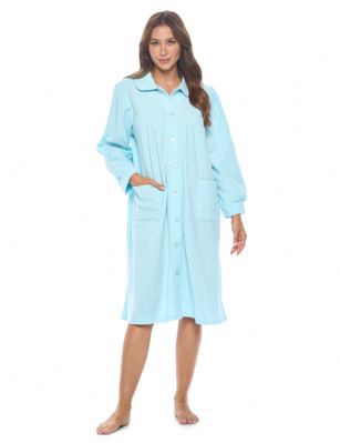Casual Nights Women's Button Front Jacquard Terry Fleece Lounger Robe with Pockets - Blue - Introducing our Soft Fleece Lounger Robe: the ultimate solution for staying comfortably warm while embracing your preferred lighter nightwear. If you're someone who runs hot but loves the snugness of a warm layer, this lounger house dress is tailored just for you. Designed to complement thinner nightgowns, it's the perfect companion for bedtime reading or TV watching. Tired of grappling with lengthy robes? Embrace the ease of our innovative bed robe, effortlessly removable, draping gracefully as you embrace peaceful slumber.Experience the coziness firsthand. Imagine the soothing embrace of this house coat during post-surgery recovery. Similar to a beloved lounger, this fleece wonder boasts a flattering collar, button-up front, and deep side patch pockets  a handy touch for stowing tissues, candy, or your cell phone. No need to compromise style for comfort  this bed jacket effortlessly combines both.And that's not all. We believe in the power of heartfelt gifting. Our lounger robe found a special place in the heart of a 99-year-old friend who perpetually battled the cold. This thoughtful gesture not only brought warmth but also beamed with love. You'll cherish its impact, just as she did.Made from easy-care polyester, this imported knee length bed longer measures approximately 42L and is machine washable, making maintenance a breeze. Whether you're winding down after a long day or seeking solace during recovery, our Soft Fleece Bed Lounger robe is your ticket to warm, comfy, and cozy nights.